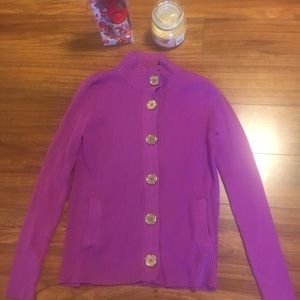 Dark pink sweater. 80% cotton 20 % Nylon .